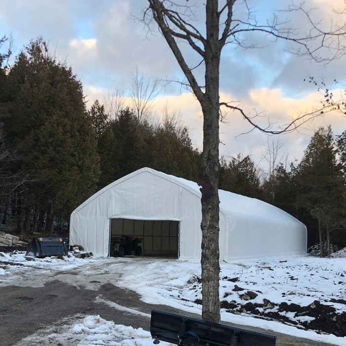 TMG Industrial 30' x 70' Straight Wall Peak Ceiling Storage Shelter with Heavy Duty 17 oz PVC Cover & Drive Through Doors, TMG-ST3070V