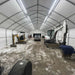 TMG Industrial 30' x 70' Straight Wall Peak Ceiling Storage Shelter with Heavy Duty 17 oz PVC Cover & Drive Through Doors, TMG-ST3070V